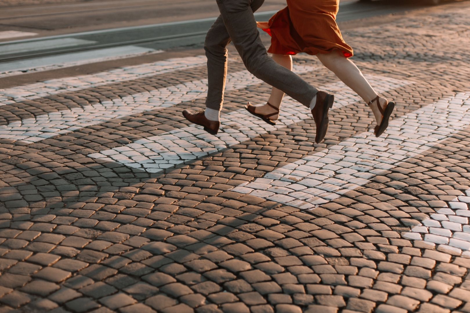 Karmic couple in lockstep crosses a street together