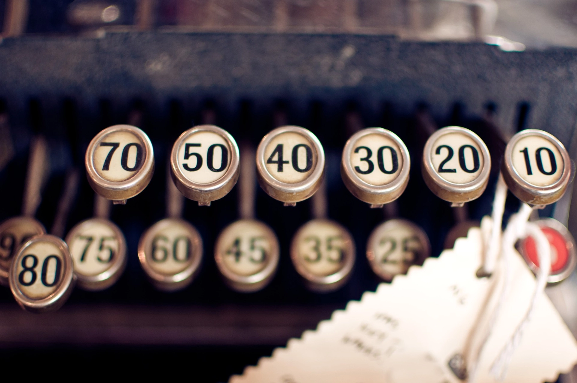 Vintage cash register showing split angel numbers